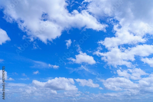 Obraz Cloudy blue sky on sunny day.