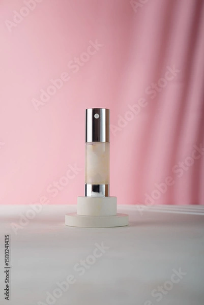 Fototapeta Cosmetics tube mockup on concrete stand, pink background. Mockup, no brand, no label template. Eye Serum Whitening, concealer