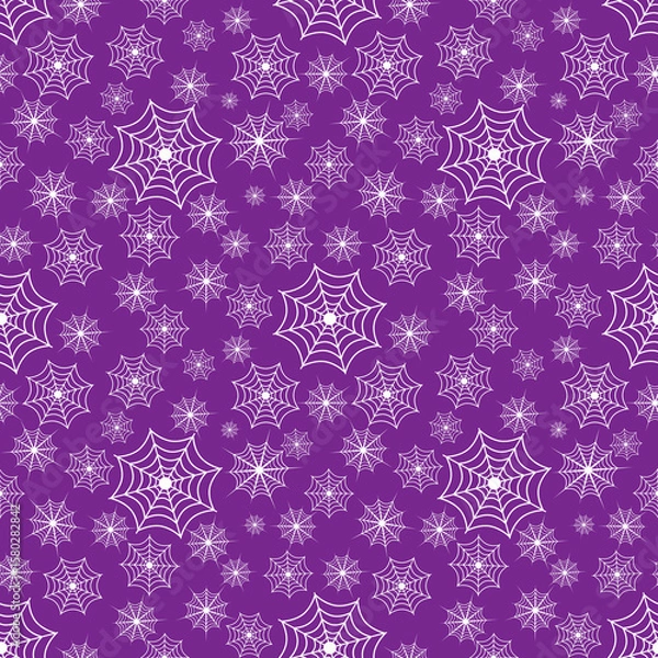 Fototapeta Hand drawn  white spider web seamless pattern on purple background for halloween theme.