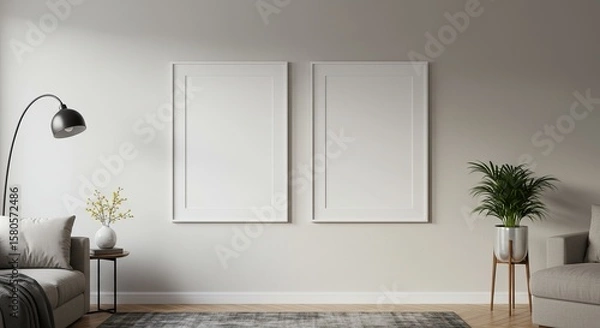 Obraz Two blank white frames on a minimalist wall. Mockup concept for interior design and art display. Scandinavian living room.