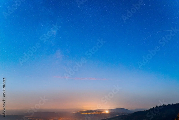 Fototapeta Night time sky with starlight and milky way galaxy