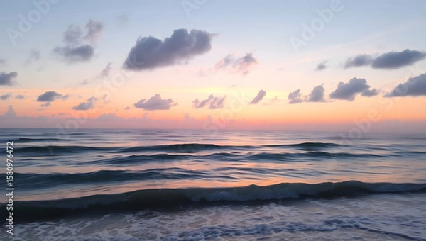 Obraz Ocean Calm – Gentle waves and a pink sunset