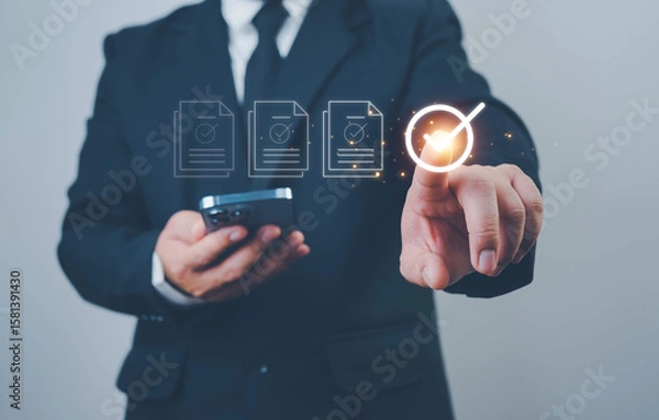 Fototapeta Audit business concept. Businessmen Using Magnifying Glass to check and evaluate financial statements. Auditing financial accounts within the organization. Audit And Fraud Investigation.