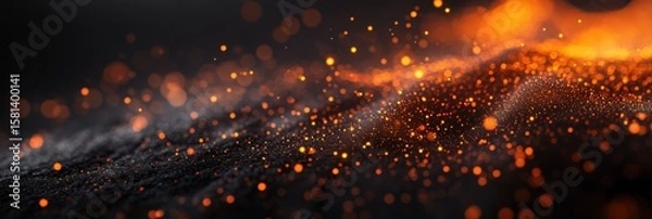 Fototapeta Vibrant orange tech sparks on dark background illustrating dynamic connections