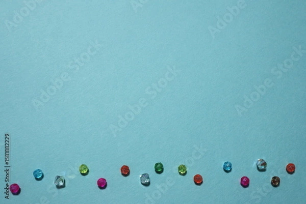Fototapeta ビーズを使ったテンプレート　水色背景