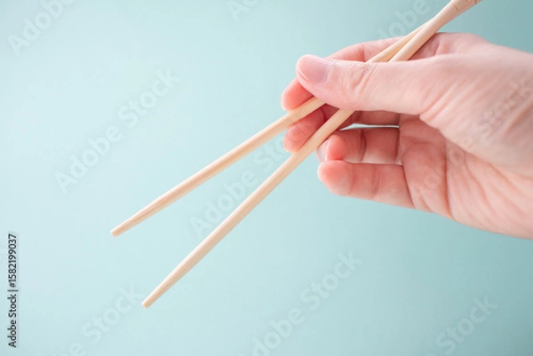 Fototapeta 割り箸を持った手