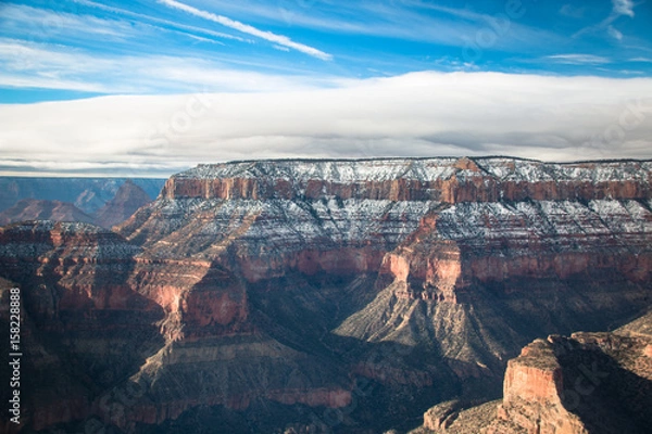 Obraz view over the north rim part in grand canyon with snow from the helicopter