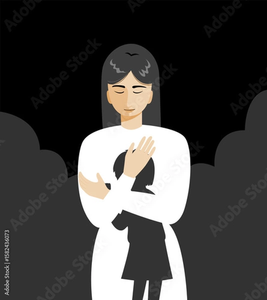 Fototapeta A woman standing and hugging herself while tapping, as if she talking to her inner child.