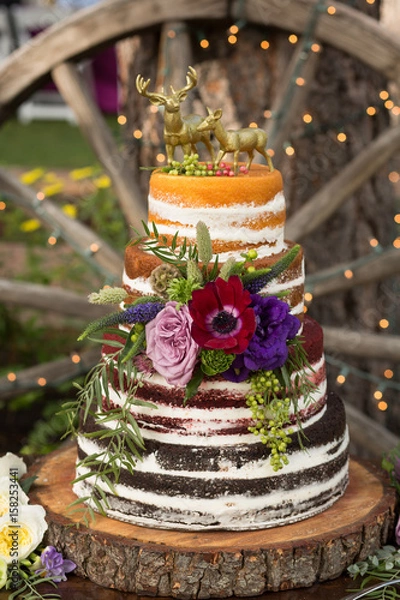 Fototapeta Rustic "Naked" Wedding Cake with multiple flavors