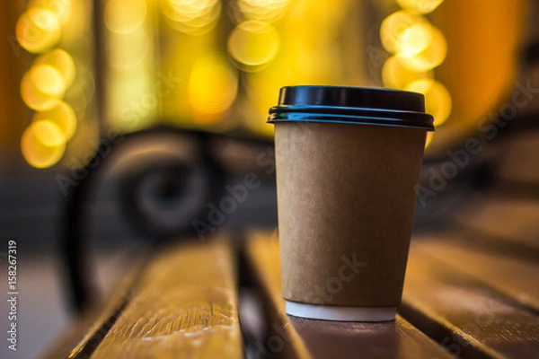 Obraz the cup of coffee on the bench