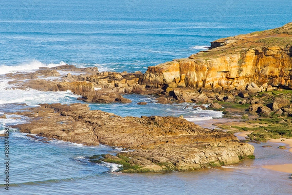 Fototapeta Landscape and morphology of the cliff coast in the municipality of Galizano in Cantabria, Spain