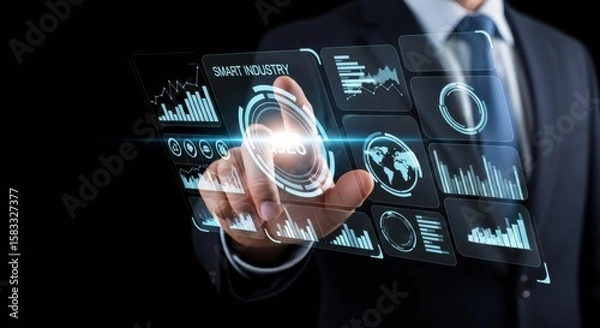 Obraz Businessman uses glowing holographic interface with chart and control to manage smart industry system, lean manufacturing, quality control, and industrial data optimization