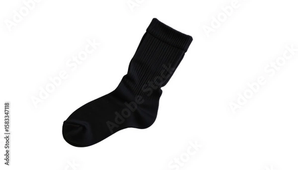 Obraz a single black sock against a dark background