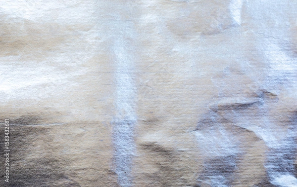 Fototapeta Shiny silver foil texture with crinkled and metallic surface. Ideal for luxury design, festive backgrounds, packaging, or elegant graphic elements