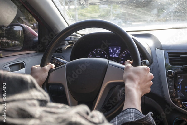Fototapeta driving with two hands