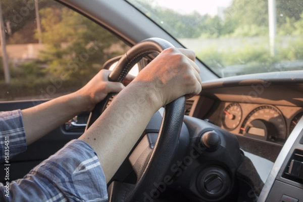 Fototapeta driving with two hands