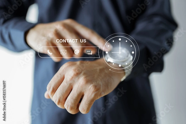 Fototapeta Contact us or Customer support hotline people connect. Businessman using a laptop and touching on virtual screen contact icons. Contact Us Customer Support Inquiry Hotline Concept.
