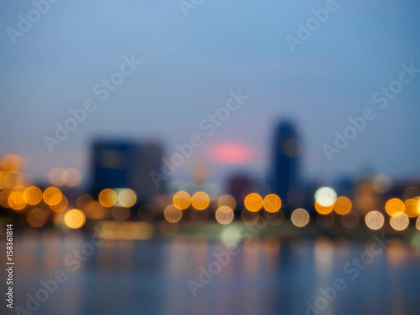 Obraz View of city night lights blurred bokeh background.