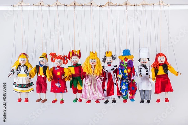 Fototapeta The raw of different puppets