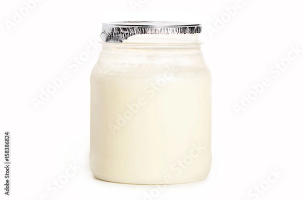 Obraz Yogurt in plastic packaging isolated on white background