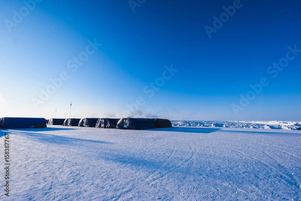 Fototapeta Camp Barneo at the north pole snow plain snow cube pattern snowflakes lines close-up