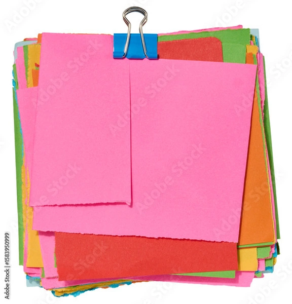 Fototapeta Stack of colorful square sticky notes with jagged edges, secured with a blue paper clip on top. Isolated background