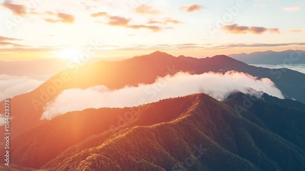 Obraz High-altitude perspective showing a massive landmass suspended above glowing golden clouds, tranquil atmosphere with dramatic sunrise tones, digital illustration, digital painting