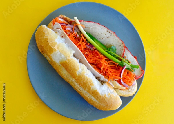 Obraz A Vietnamese style roll with salad on a plate. 