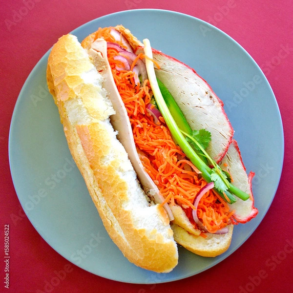 Obraz A Vietnamese style roll with salad on a plate. 