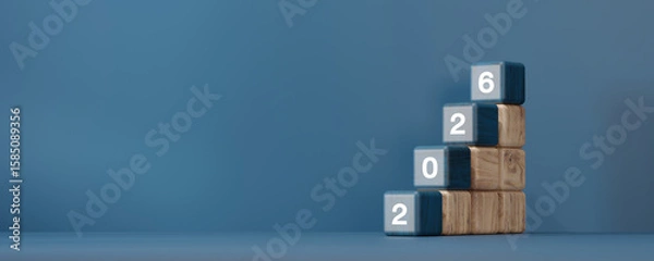 Fototapeta Wooden cubes forming year into 2026. Concept of New Year goals, planning, transition, and business success.