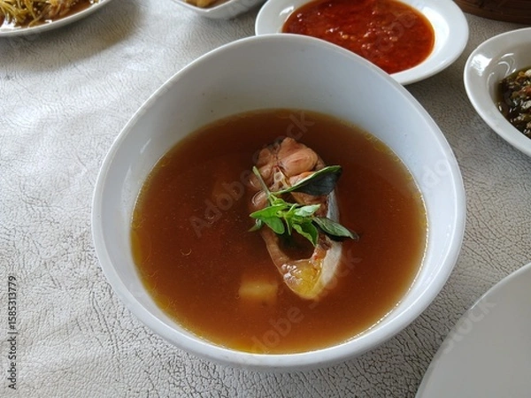 Fototapeta Pindang Patin. Palembang specialties, South Sumatra, from Patin Fish with a savory and spicy sour sauce