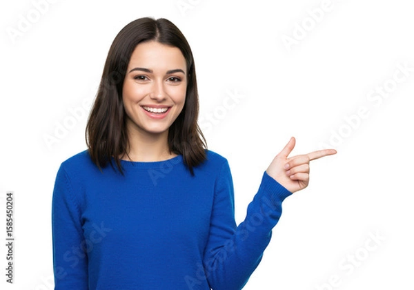 Obraz A happy young woman with short dark hair smiles and points to the right, wearing a blue sweater, isolated on a transparent background