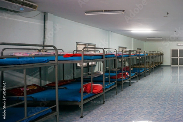 Fototapeta a row soldier bunk beds.
