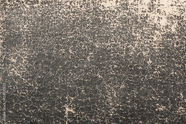 Fototapeta View Of Torn Black Leather Fabric Texture Background.