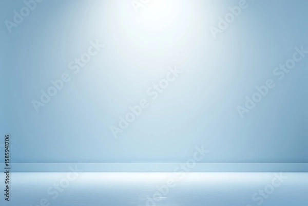 Obraz Empty light blue studio background with bright spotlight image