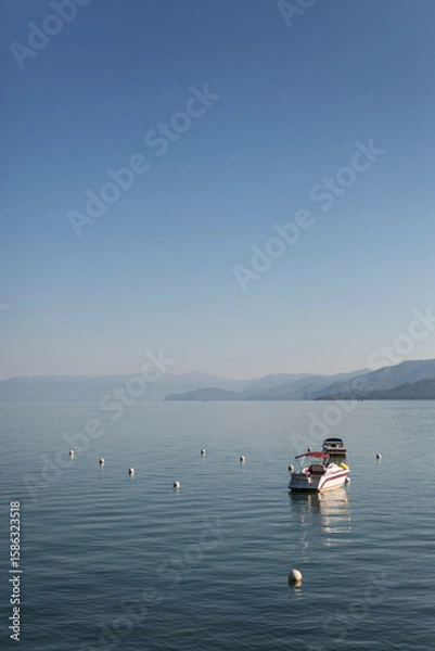 Obraz Peaceful calm lake with boat