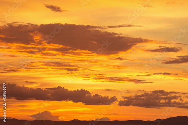 Fototapeta Colorful dramatic sky with cloud at sunset.Sky with sun background