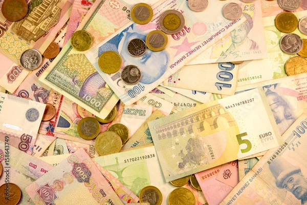 Fototapeta Different currency note and coins from different countries background