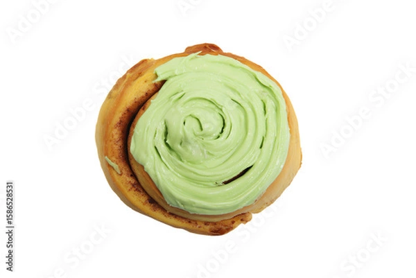 Fototapeta a pastry with green frosting on top of it
