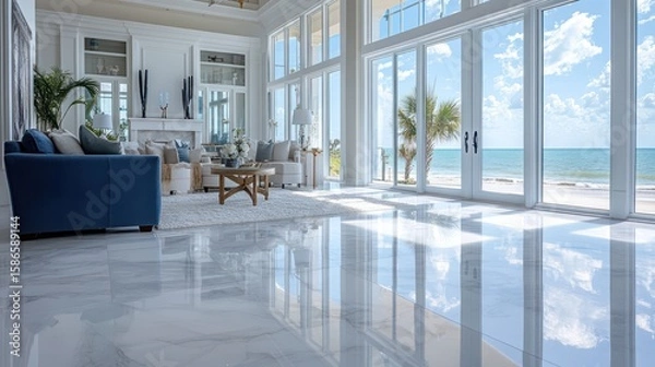 Obraz Bright, airy living space with large windows overlooking ocean and beach, with marble flooring