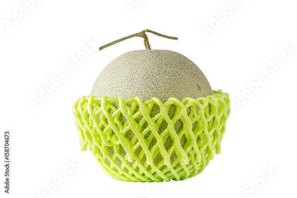 Fototapeta Sweet Japanese melon in green net foam protection on white background, healthy eating concept.