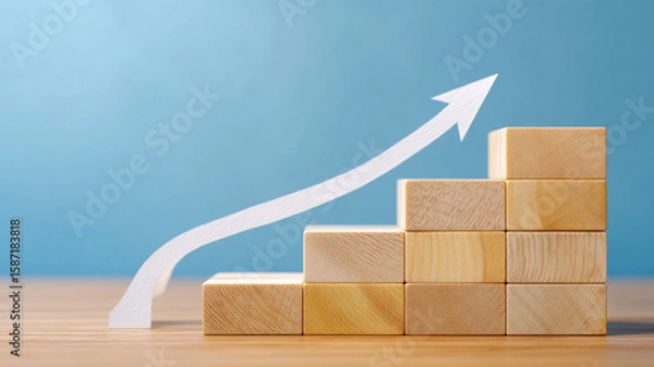 Fototapeta Wooden blocks forming stairs with an upward trending arrow