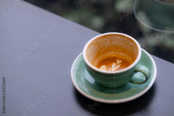 Fototapeta empty cup of coffee with heart latte art