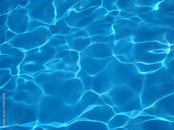 Fototapeta the reflection of the sun in the calm cold water