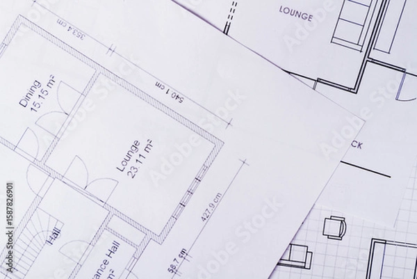 Fototapeta Construction background. House plan on table texture. Working drawings of a house project design..