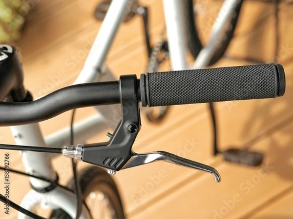 Fototapeta Bicycle handle bar with black grip and break.
