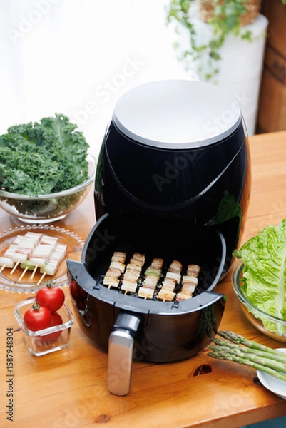 Obraz エアフライヤーで調理中の豚バラ串