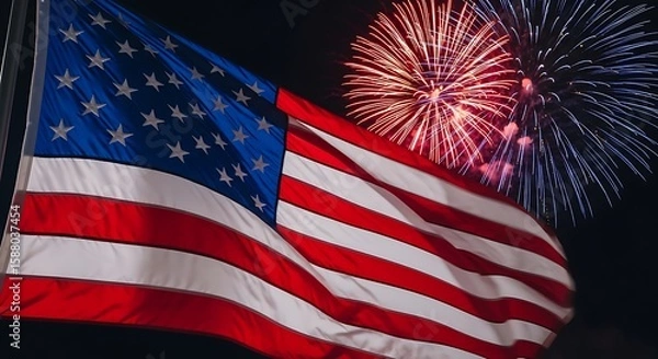 Fototapeta American Flag Waving with Fireworks Display Against a Black Sky