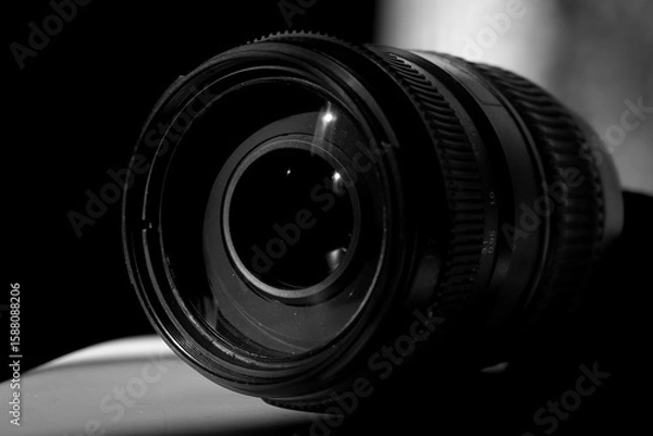 Fototapeta Close up of a dslr camera lens in low light