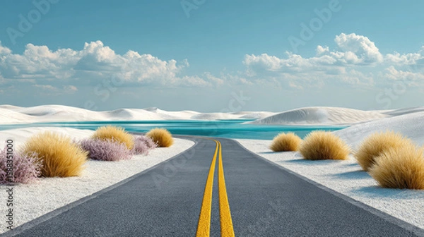Fototapeta A road leading to a lake surrounded by white dunes under a partly cloudy blue sky in a desert scene